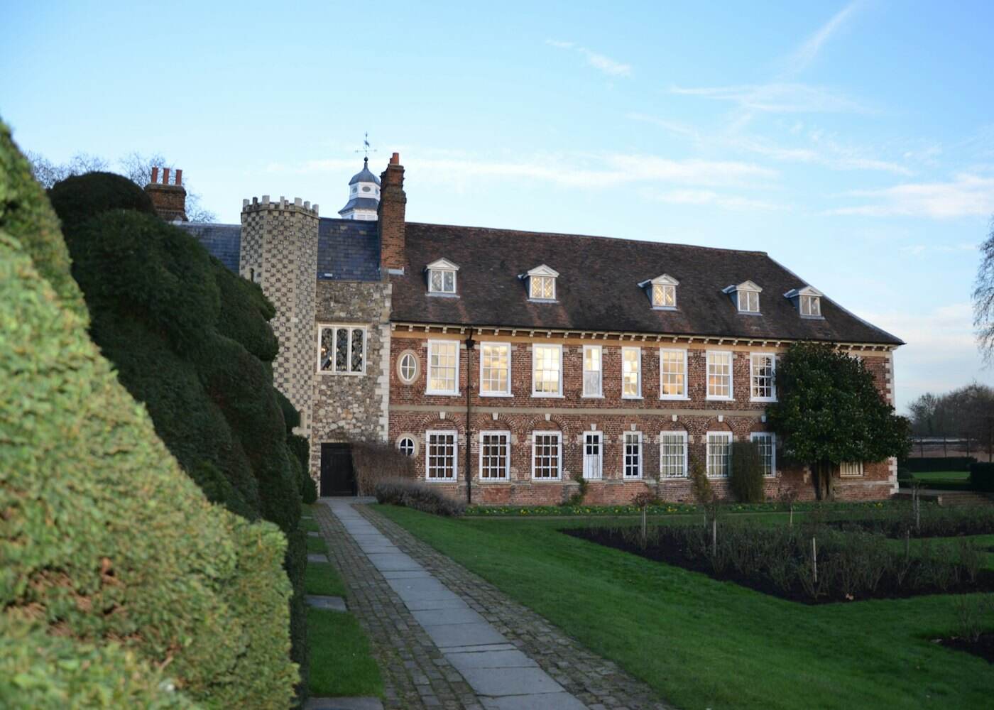 A large brick house in the Cheshire countryside