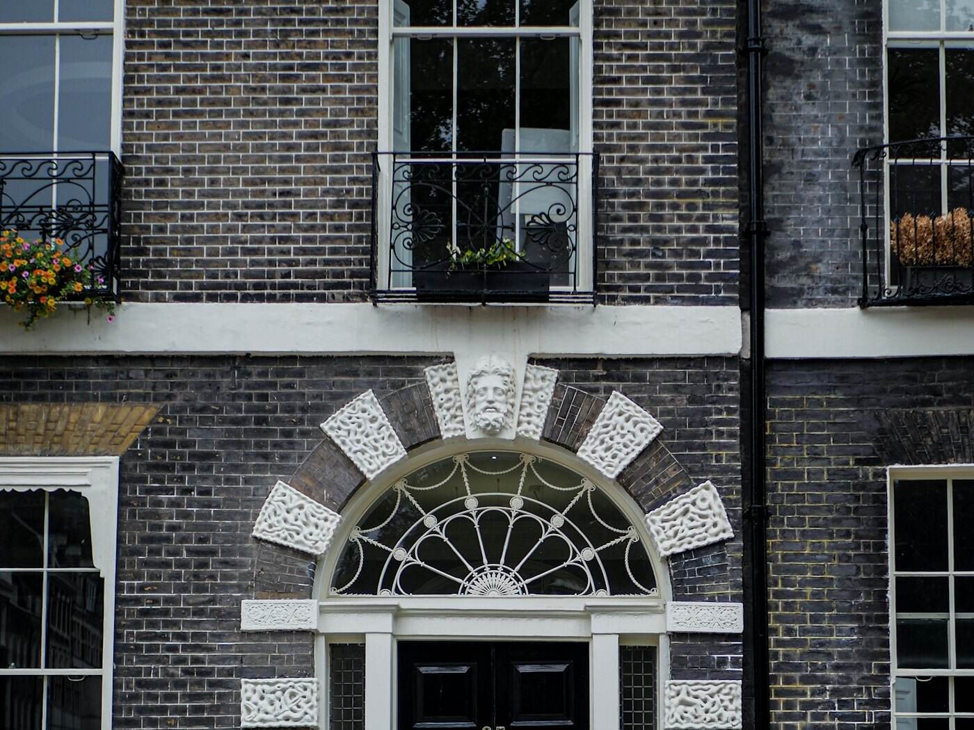 A Georgian front door with railings on King Street, Knutsford
